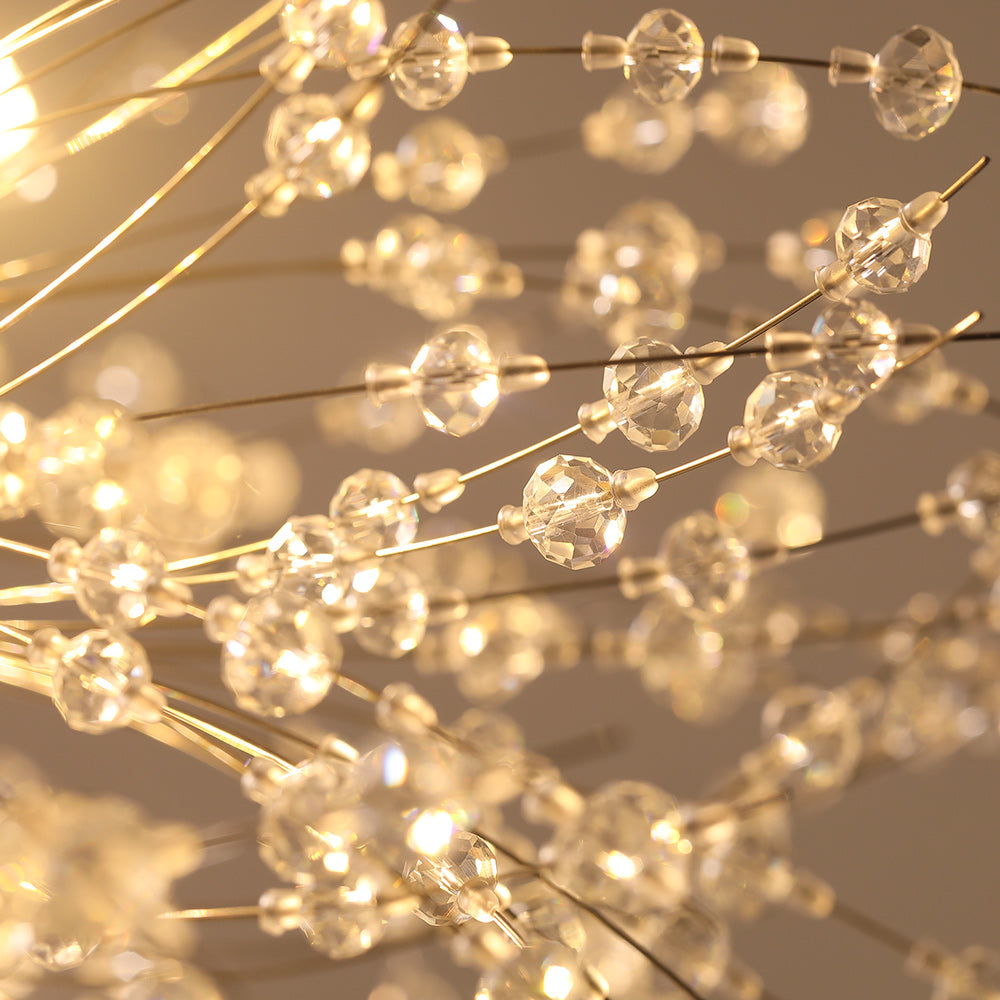 Delphine firework crystal chandelier – lit crystals with a warm glow
