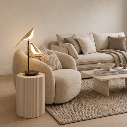 Avelle gold bird table lamp styled in a home interior