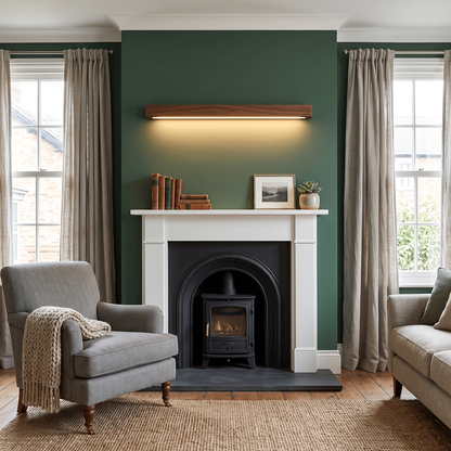 Alessio walnut wall light above a fireplace