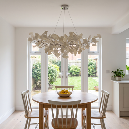 Seraphina nickel chandelier over a round kitchen table