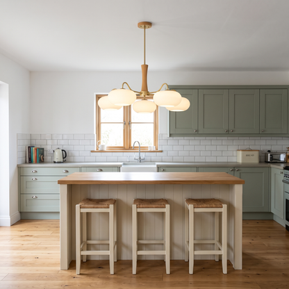 Tall Cassius chandelier over a kitchen island