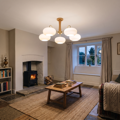 Cassius chandelier in a low-ceiling cottage sitting room