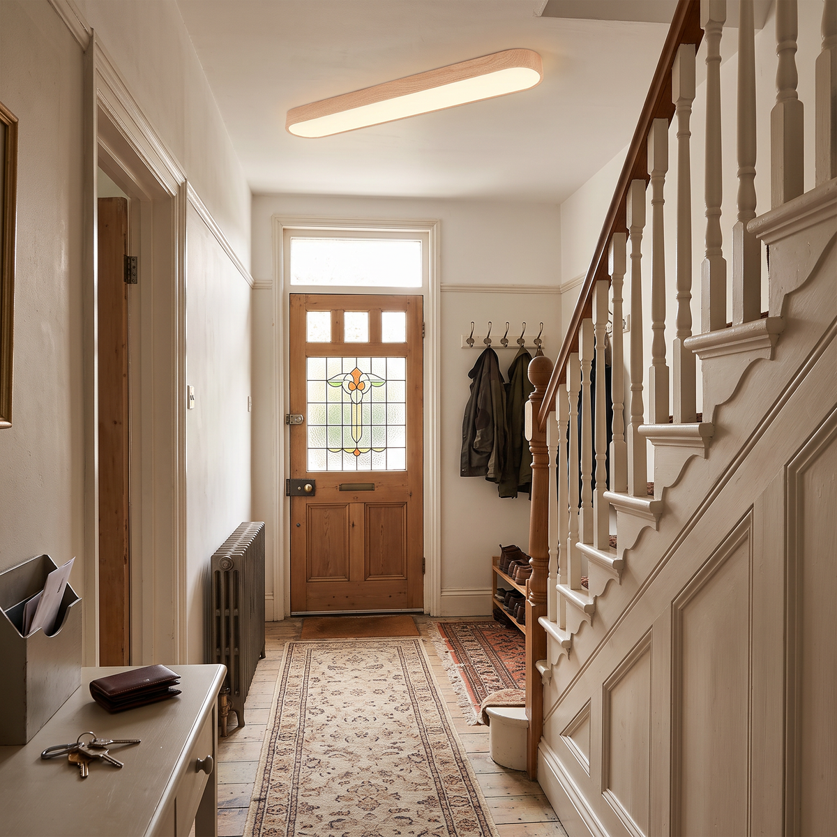 Elodie oval ceiling light lighting a UK hallway