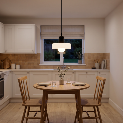 Verona glass pendant – glowing above a small kitchen table
