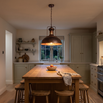 Rafferty rustic dome pendant – glowing above a kitchen island