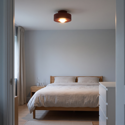 Ottilie red resin ceiling light – glowing in a bedroom