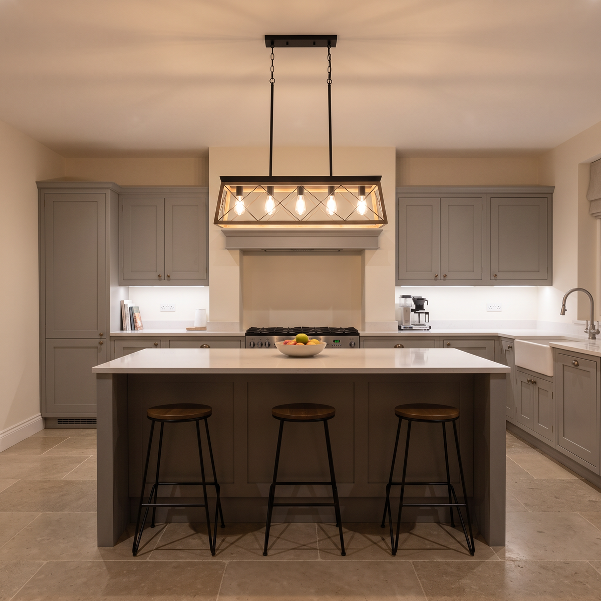 Lysander linear chandelier – glowing above a kitchen island