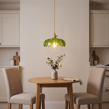Rosalba flower glass pendant – glowing above a bistro table