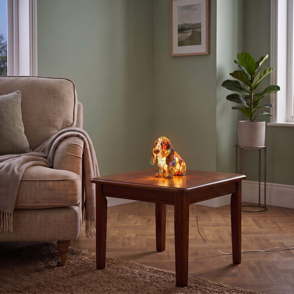 Wilfred dog figurine lamp – glowing on a side table