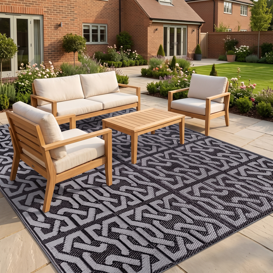 Tegan reversible outdoor rug – under a patio lounge set