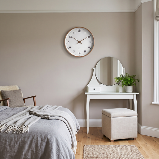 Melisande round wall clock – above a dressing table