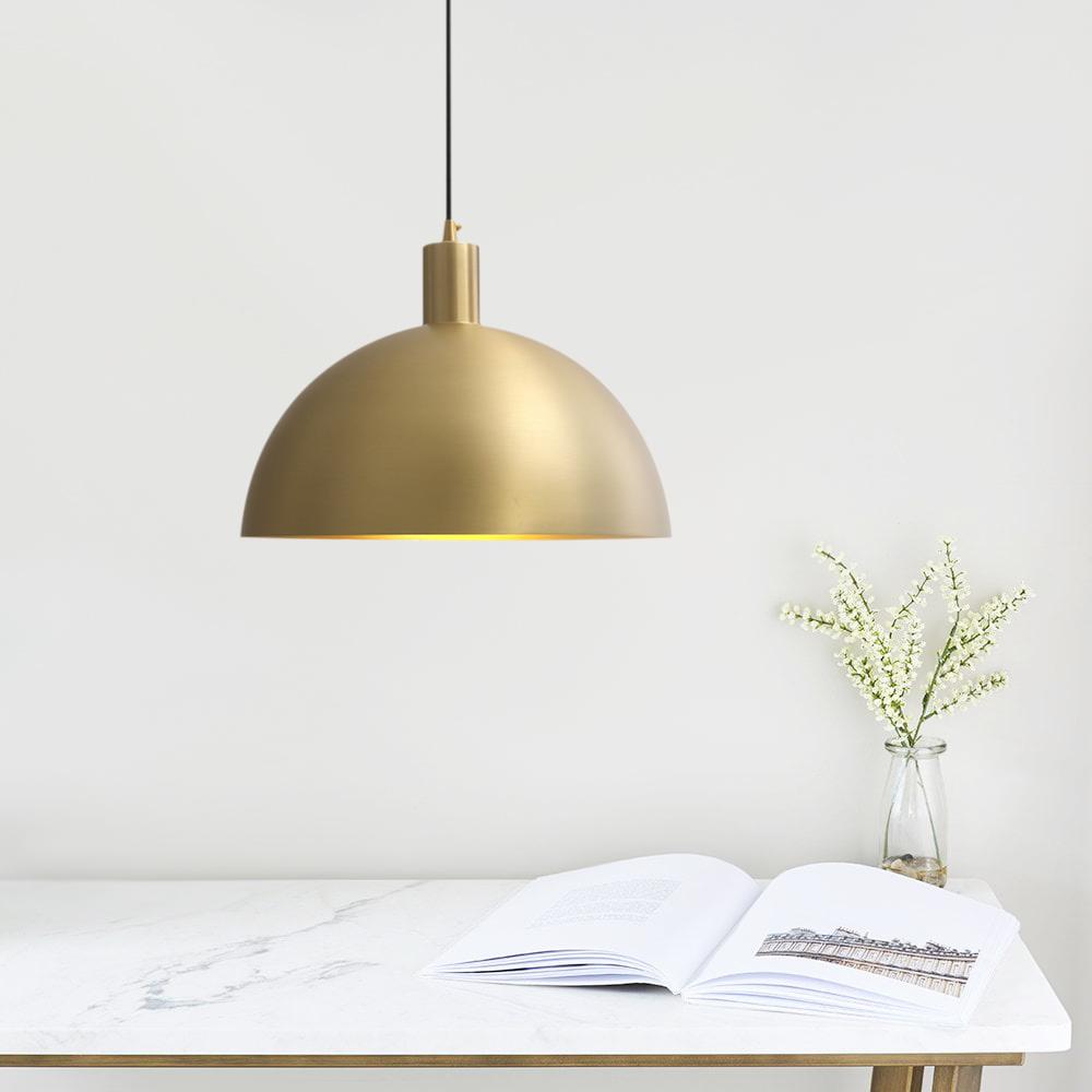 Vincenzo lipped dome pendant – in brass above a desk