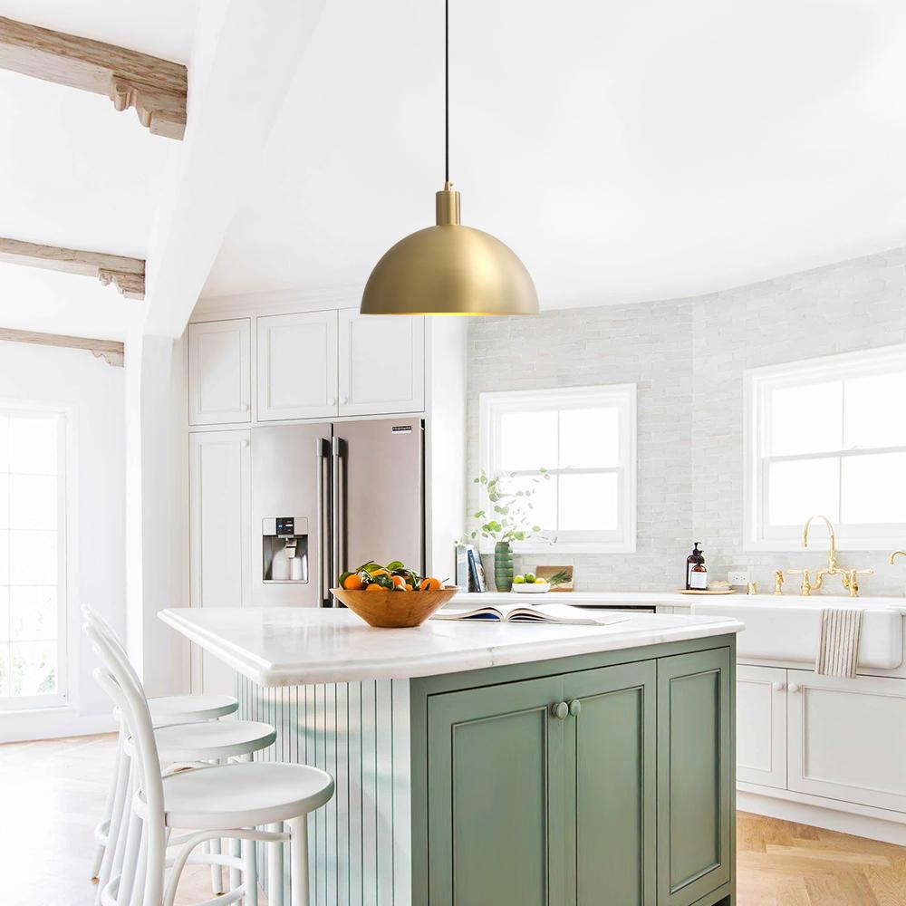 Vincenzo lipped dome pendant – in brass over a green island