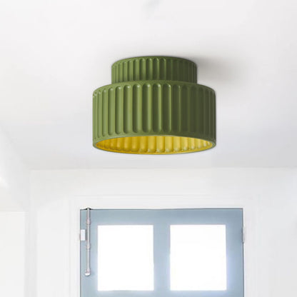 Colette ribbed resin ceiling light – in green, close view in a room