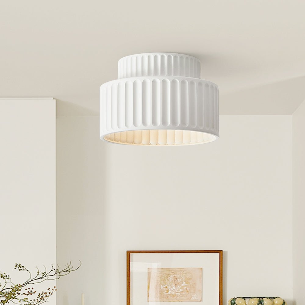 Colette ribbed resin ceiling light – in white above artwork