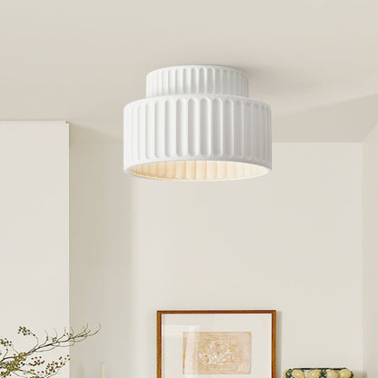 Colette ribbed resin ceiling light – in white above artwork