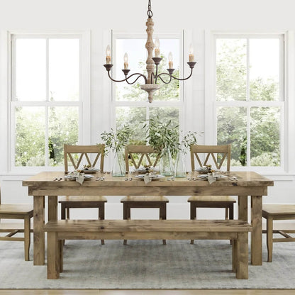 Amalia rustic candle chandelier over a farmhouse dining table