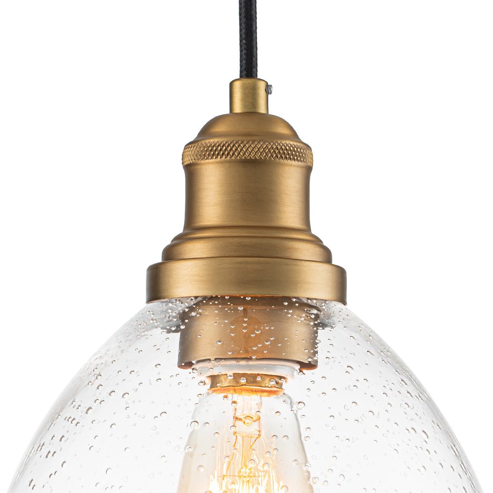Sienna seeded glass dome pendant – brass holder close-up