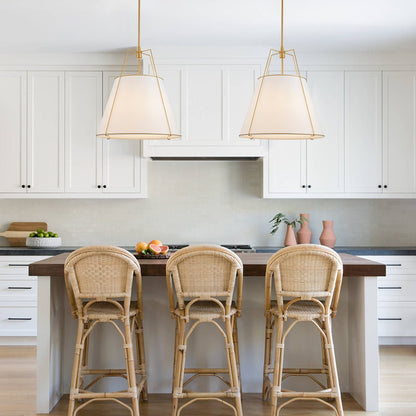 Ophelia tapered linen pendant – two over an island with rattan stools