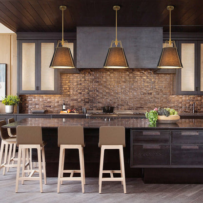 Ophelia tapered linen pendant – three over a dark island with brick wall