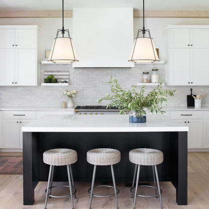 Ophelia tapered linen pendant – two over a black kitchen island