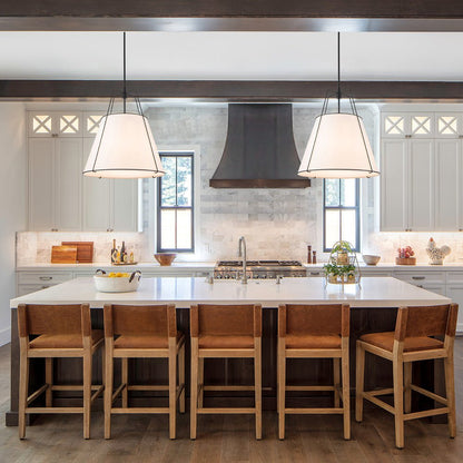 Ophelia tapered linen pendant – three over a kitchen island