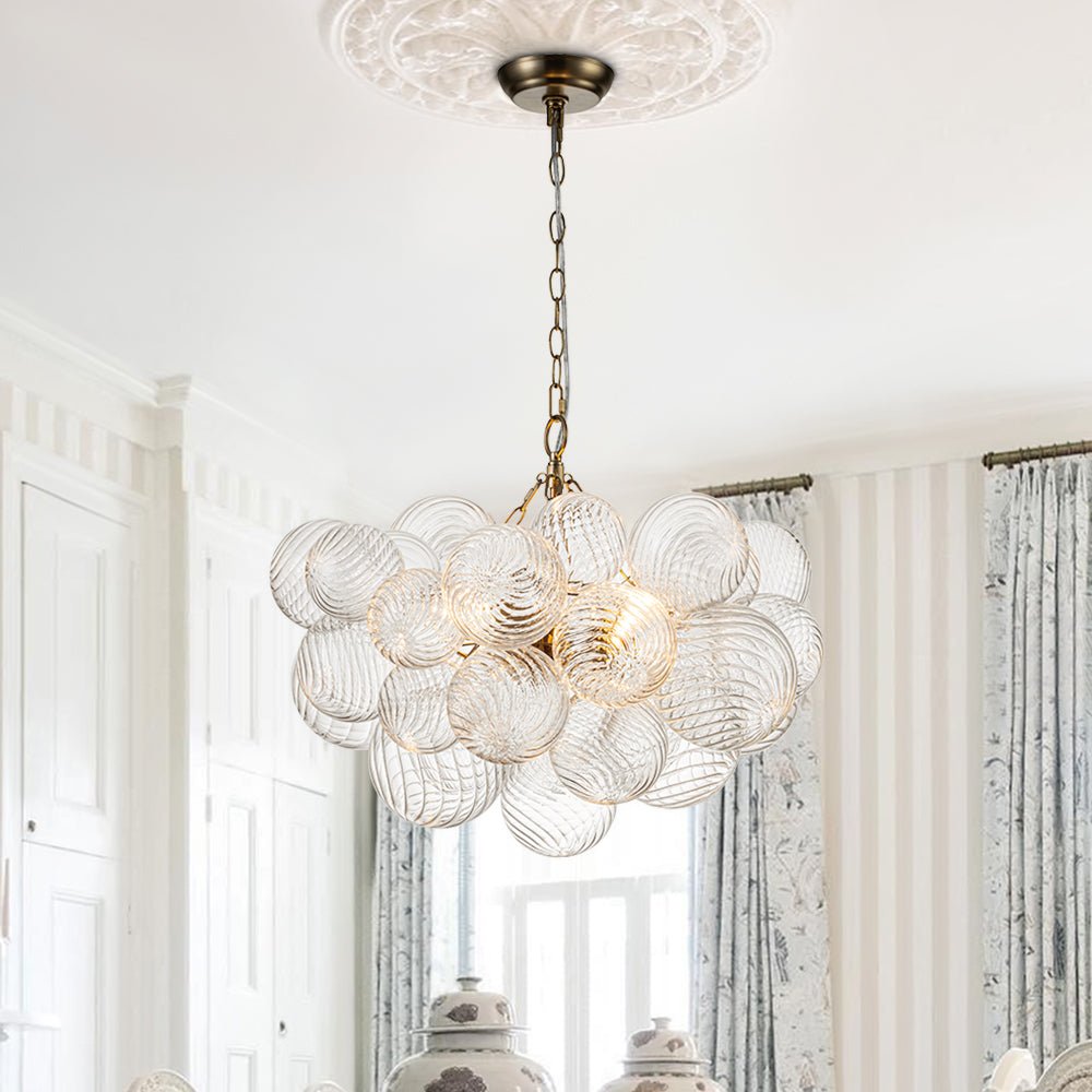 Annika bubble chandelier – in a bright room by curtains