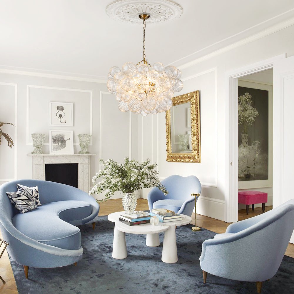 Annika bubble chandelier – in a living room with blue sofas