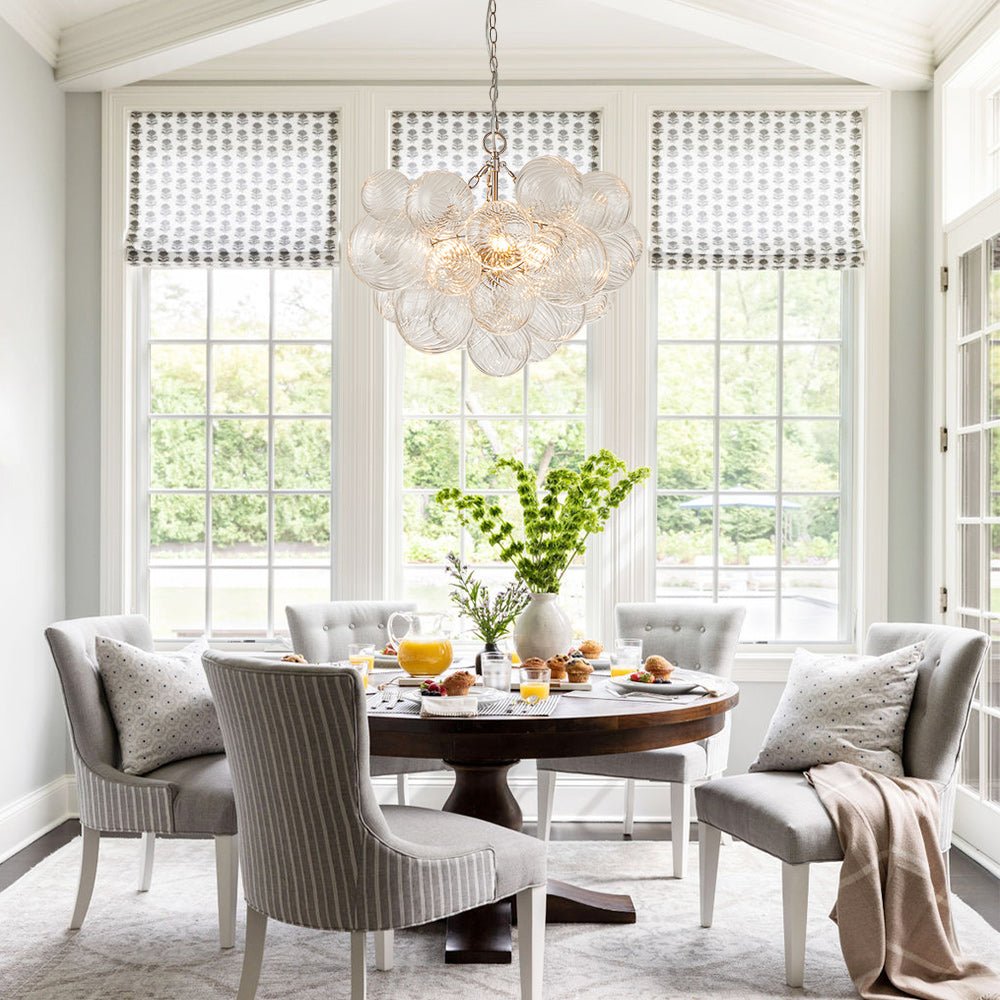 Annika bubble chandelier – over a dining table in a bright room