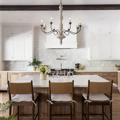 Amalia rustic candle chandelier above a kitchen island