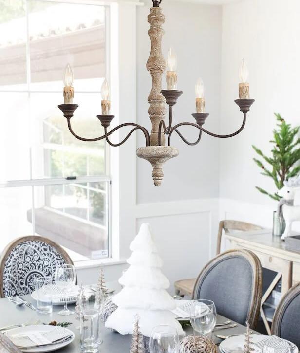 Amalia 5-light candle chandelier in a bright dining room