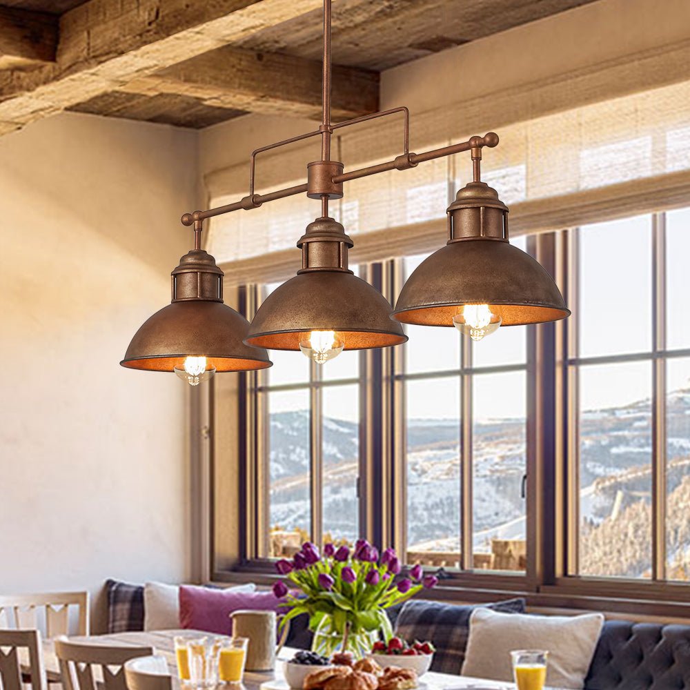 Benedict 3-light linear dome pendant – in bronze in a rustic living room