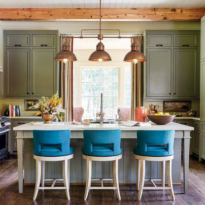 Benedict 3-light linear dome pendant – over an island with blue stools
