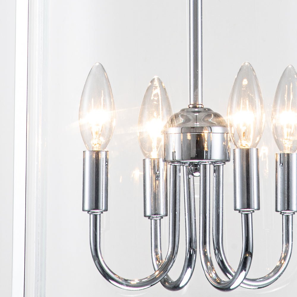 Tristan glass lantern chandelier – chrome candle arms close-up