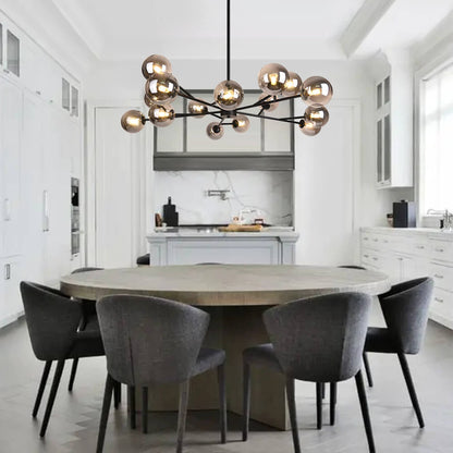 Paloma bubble chandelier – black over a dining table
