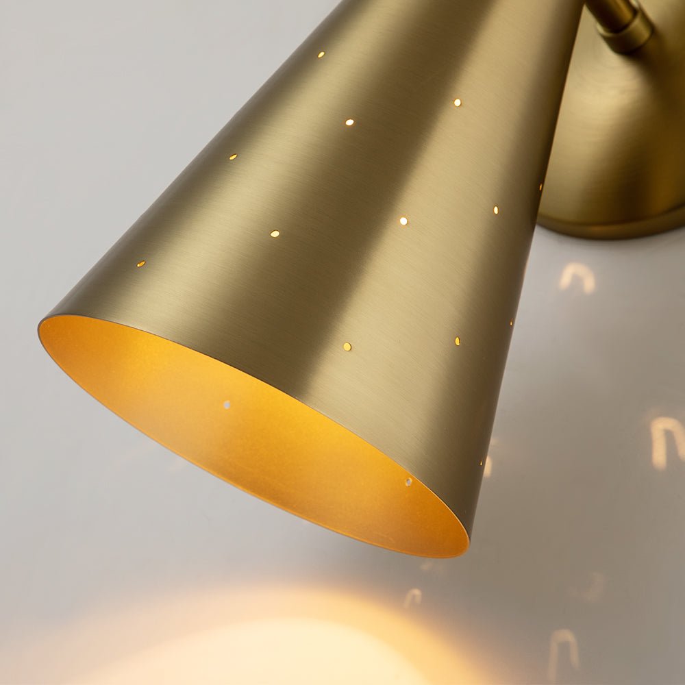 Stellan hourglass wall light – brass shade interior close-up