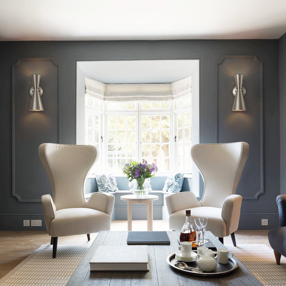Stellan hourglass wall light – pair in a living room