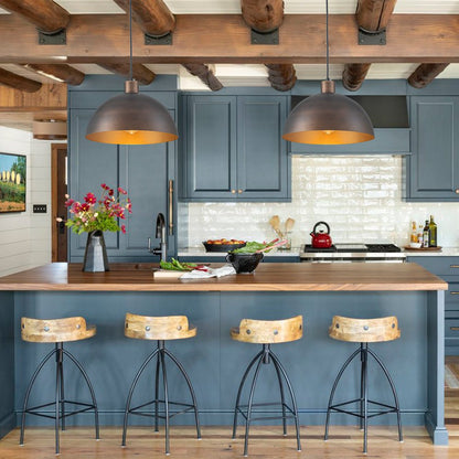 Vincenzo lipped dome pendant – over a kitchen island with blue cabinets