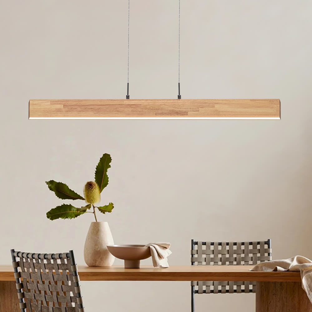 Florian linear LED pendant – over a dining table by a window