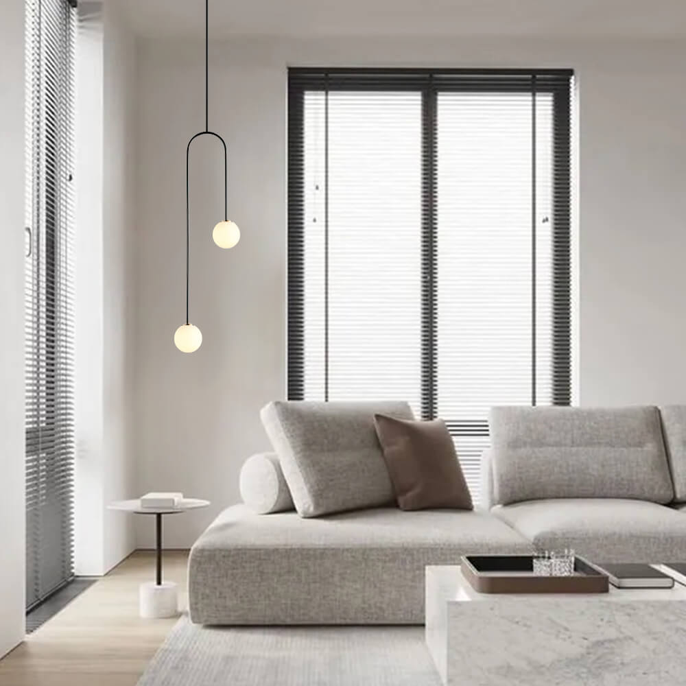 Mirabel twin globe pendant light – in a living room