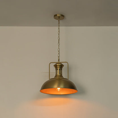 Leopold metal dome pendant light – in gold with a warm glow