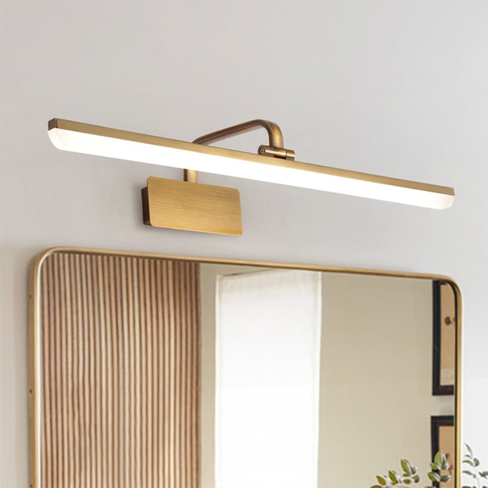 Cosima gold LED vanity light – in cool white above a mirror