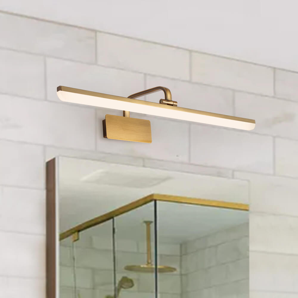 Cosima gold LED vanity light – above a bathroom mirror