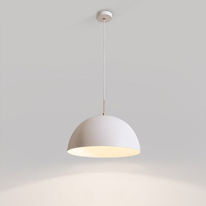 Dorian dome pendant – in white against a grey wall
