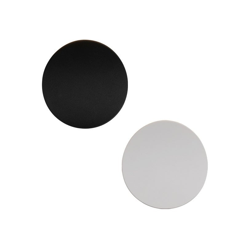 Camille round LED wall light – in black and white, front view