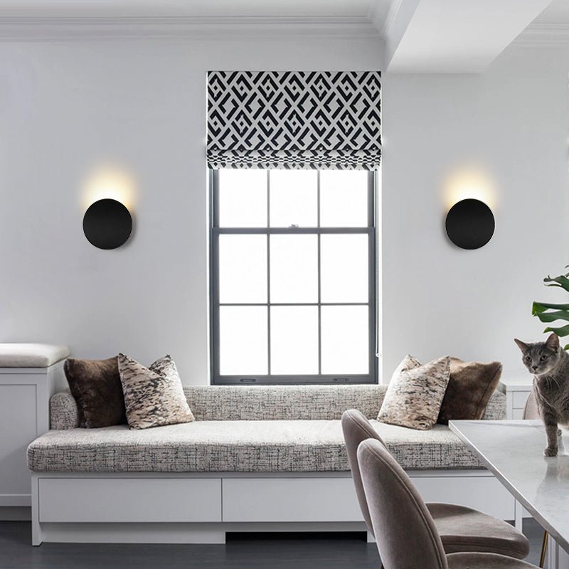 Camille round LED wall light – pair either side of a window