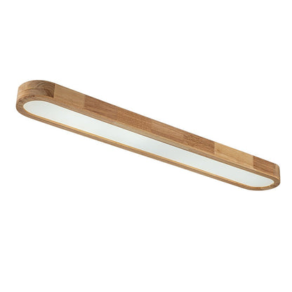 Viviane oval LED ceiling light – angled, lit on white