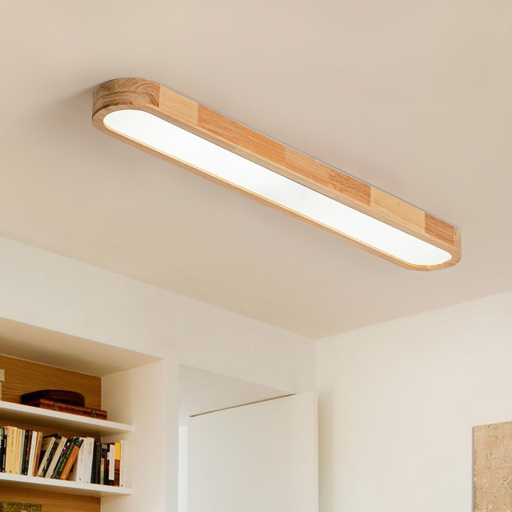 Viviane oval LED ceiling light – in a bedroom