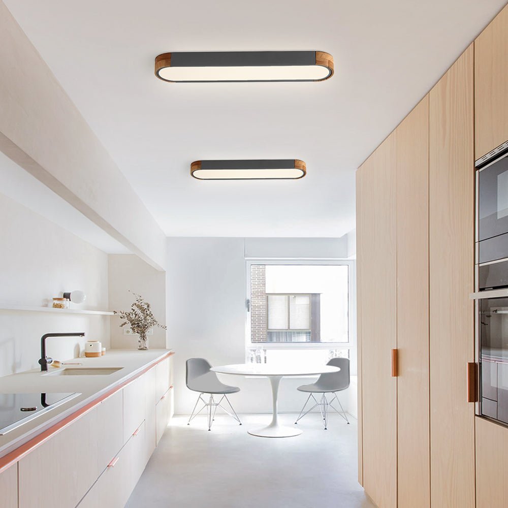 Two Imogen oval LED ceiling lights in a white kitchen