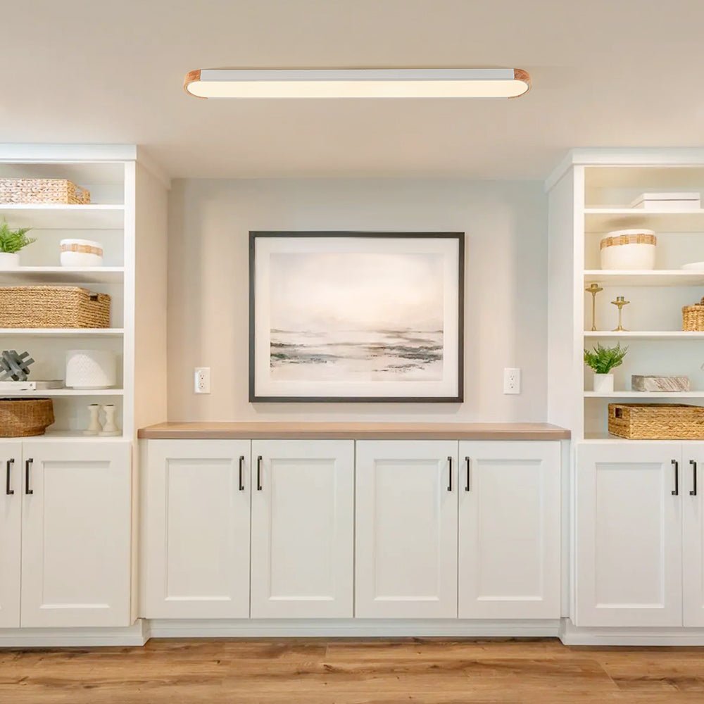 Imogen white 122 cm oval LED ceiling light in a living room